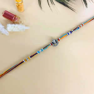 Lord Ganesha Rakhi with Vibrant Threadwork