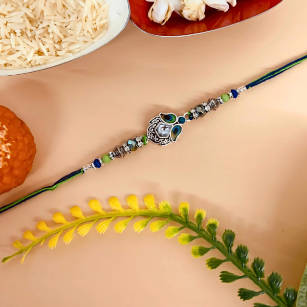 Elegant Oxidised Rakhi with Blue & Green Accents
