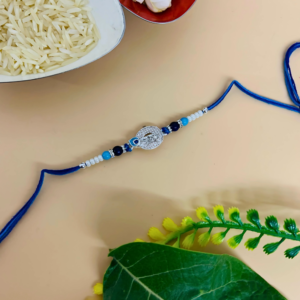 Krishna Mor Pankh Rakhi with Blue Beads and Thread