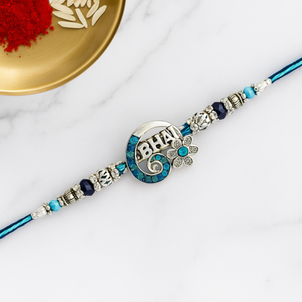 Royal Blue "Brother" Rakhi with Silver Beads & Floral Charm